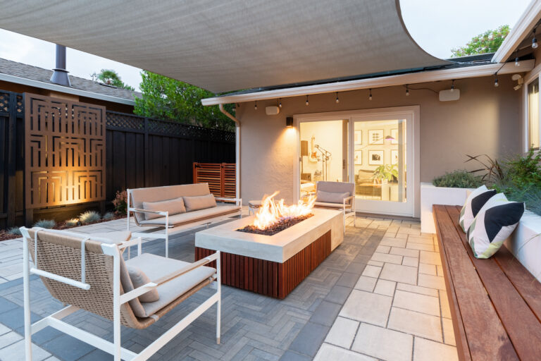 backyard seating area with fireplace