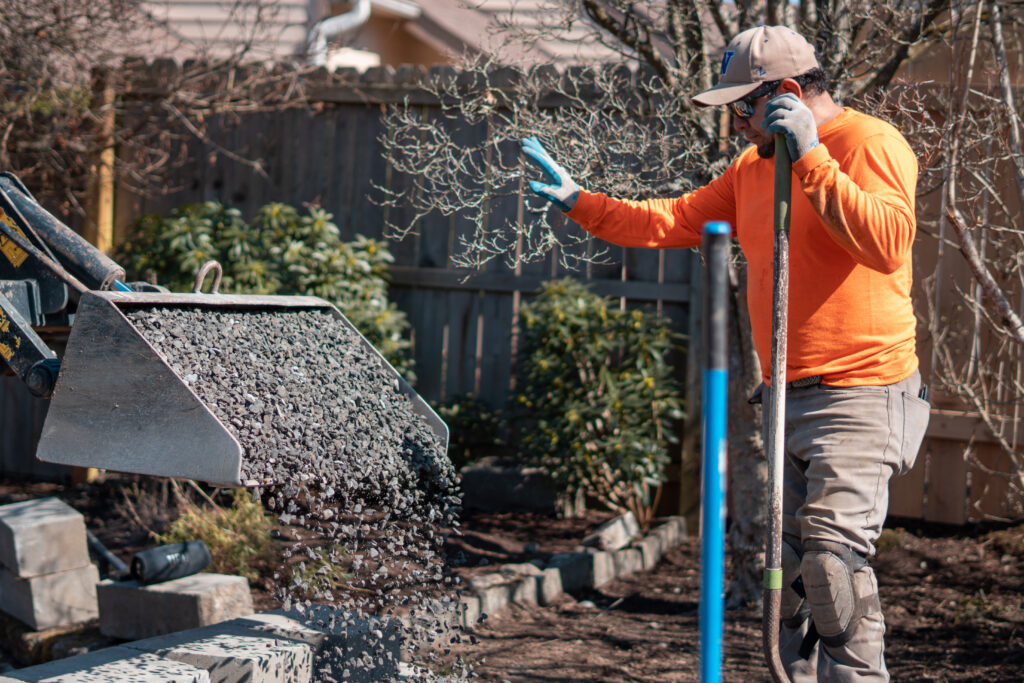 Aggregate base preparation by the Provenance Outdoor Living crew